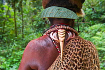 Huli Wigmen with Blyth's Hornbill bills as necklace decoration, Tari Southern Highlands, Papua New Guinea, August 2011