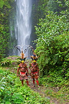 Timan Tumbo and Hale Johu - Huli Wigmen adorned in bird of paradise plumes Tari Valley, Papua New Guinea, August 2011