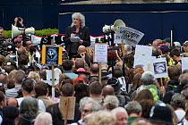 Rock star and activist Brian May address marchers at anti badger cull march, London, 1st June 2013.