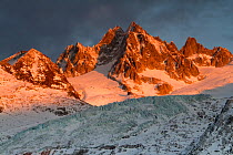 Mountains in snow, Aiguille du Tour with Tower Glacier in front, at sunset, Chamonix, Haute Savoie, France. December 2011