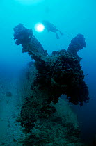 Diver on the propellor of the 'Heian Maru' large cargo vessel sunk at Chuuk Lagoon during Operation Hailstone 17/18th February 1944, Chuuk Lagoon, Federated States of Micronesia
