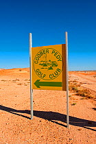 Sign for Coober Pedy golf course - an outback desert, opal mining town, South Australia, June 2010