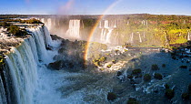 Rainbow over Iguasu Falls, on the Iguasu River, Brazil / Argentina border. Photographed from the Brazilian side of the Falls. State of Parana, Brazil. September 2012