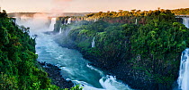 Iguasu Falls at sunrise on the Iguasu River, Brazil / Argentina border. Photographed from the Brazilian side of the Falls. State of Parana, Brazil, September 2012
