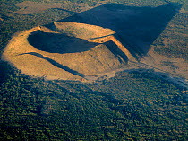 A small volcanic cone with crater, that has been split by two faults. The eruption was caused by the  faults, and the faults continued to move after the eruptions had ceased. Rift Valley, North west o...