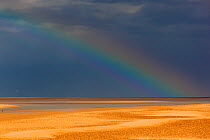 Rainbow over Holkham Bay National Nature Reserve, Norfolk, UK, April 2013