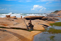Small wooden statue on the coast of the Indian Ocean, Yala NP, Sri Lanka, April 2013