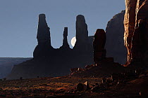 Thumb and Three sisters rock formations, in the early evening, Monument Valley Navajo Tribal Park, Arizona, USA December 2012