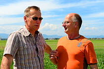 Martin Klipfel, mayor of Grussenheim and Jean-Paul Burget from Sauvergarde Faune sauvage / Save the Wildlife Association,  talking about releasing of Common hamsters (Cricetus cricetus).  Grussenheim,...