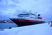 View of MV Polarlys, a small cruise ship specializing in coastal cruises along the North Norway coast, Vardo harbour, Vardo, March 2013.