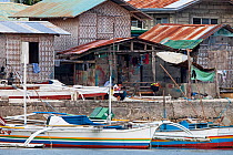 Houses and bangka boats, Bilang Bilangang Island, Danajon Bank, Central Visayas, Philippines, April 2013
