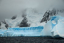 Blue iceberg in Iceberg Alley, Pleneau Island. Antarctica.