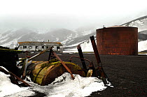 Old abandoned buildings from a whaling station. Deception Island, Antarctica