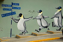 Drawings of penguins on a mural in downtown Ushuaia, Tierra del Fuego, Argentina.