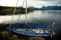 Boat moored in the Beagle Channel (named after visit of the HMS Beagle and Darwin) between Chilean and Argentinian areas of Tierre del Fuego