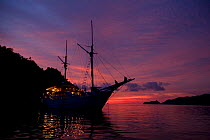 MV Pindito liveabord at sunset, Raja Ampat, Irian Jaya, West Papua, Indonesia, Pacific Ocean