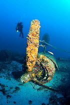 Scuba diver exploring the wreck of aeroplane 'B-24 Liberator'  Vis Island, Croatia, Adriatic Sea, Mediterranean