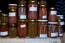 Jars of Anchovies, sardines and capers for sale in the Market of Vis Island, Croatia, Adriatic Sea, Mediterranean