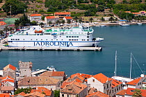 Harbour of Vis village with 'Jadrolinija' ferry, Vis Island, Croatia, Adriatic Sea, Mediterranean