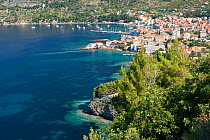 Stupiste cape, Komiza on background, Vis Island, Croatia, Adriatic Sea, Mediterranean