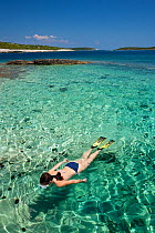Woman snorkeling at Rukavac beach, Vis Island, Croatia, Adriatic Sea, Mediterranean