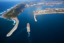 Aerial photograph of Durban Harbour breakwater with freighter boat entering the harbour, KwaZulu-Natal Province,South Africa, May 2010