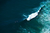 Aerial photograph of surfers on waves, Indian Ocean, KwaZulu-Natal Province, South Africa, May 2010