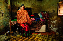 Kanchi Tamang, widow, in her small room in Kathmandu, in Namaskar Association House of Widows'. Culturally in Nepal women lose many rights when they become widows and may be treated badly by their fa...