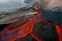 Tolbachik Volcano erupting with lava flowing down the mountain side. Kamchatka, Russia. November 29th 2013. Winner of the Wildscapes category, Wildlife Photographer of the Year Awards (WPOY competitio...