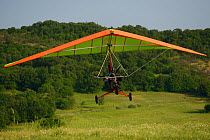 Microlight in flight over Arda river canyon, Madzharovo, Eastern Rhodope Mountains, Bulgaria, May 2013.