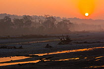 Sunrise along the Phipsu River, Phipsu Wildlife Sanctuary, Assam, India, 2010.