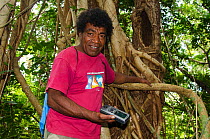 Benoit Tangopi from ASPO team surveying nests of endangered Uvea Parakeet (Eunymphicus uvaeensis) Gossanah, Ouvea, Loyalty Islands Province, New Caledonia, August 2012.