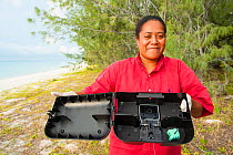 Anna Baouma from ASPO trapping Polynesian rat (Rattus exulans) around wharf as part of invasive species management, Lekiny, Ouvea, Loyalty Islands Province, New Caledonia, August 2012.