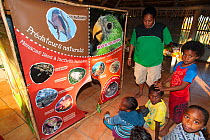 Anna Baouma from A.S.P.O. teaching children about conservation of New Caledonia. Ouvea, Loyalty Islands Province, New Caledonia, August 2012.