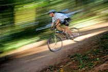 Mountain bike ridding at Saint Edwards Park, Washington, USA. Model released.
