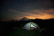 Campsite at night on Cougar Ridge in the Mount Baker Wilderness with Mount Baker in the distance, Mount Baker-Snoqualmie National Forest, Washington, USA, August, 2013.