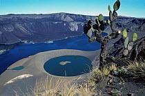 Volcanic caldera with tuff cone and lake, formed by collapse of shield volcano. Cerro Azul, Isabela Island, Galapagos, Ecuador.