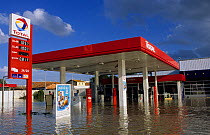 Flooded petrol station in Arles city flooded by the Rhone in December 2003. Camargue, France.