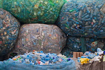 Bags of plastic bottles at a recycling station, Kisumu, Kenya