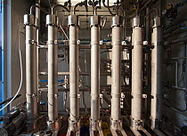 Vertical filters in a biogas plant used to separate methane from carbon dioxide, water and oxygen, Spain January 2013
