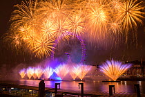 Fireworks over the London Eye on New Years Eve 2012. London, England, UK.