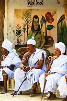 Voodoo / Vodun priests and priestesses at Voodoo sacrifice ceremony, Benin, February 2011.