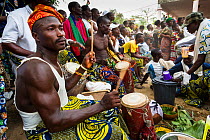 Musicians and dancers during a traditional Zangbeto voodoo ceremony, Benin, Africa, February 2011.