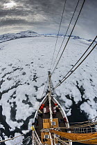 View from the top of a mast of a sailing boat in pack ice in Woodfjord, Svalbard, Norway, June, 2012.