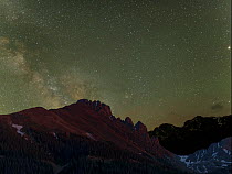 The Milky Way rises over the Craigs, a mountain in the Never Summer Range of the Rocky Mountains, Colorado, July.