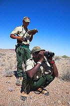 Save the Rhino Trust trackers on patrol in the field, from Ugab river camp, Save the Rhino Trust, Damaraland, Namibia, May 2013