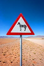 Zebra crossing animal warning sign, Namib Desert, Namibia, April