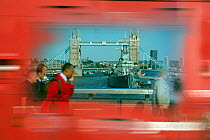 Abstract photo of Tower Bridge, with blurred motion red bus, London, June 2013. Digitally manipulated.