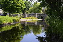 River Clun and the 14th Century Packhouse Bridge at Clun, Shropshire Hills AONB, Shropshire, England, July 2013.