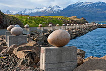 'Eggin i Gledivik?' by Siguraur Guamundsson, ?34 giant granite eggs along the coast? at Djupivogur, Iceland, June 2011.